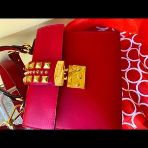 This handbag is worth $450.00 I bought I brand new for $350.00